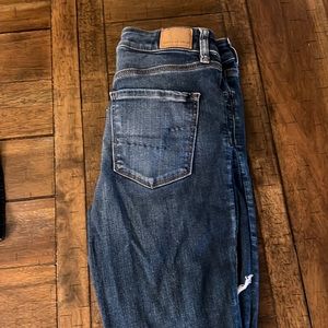 AE Next Level Stretch, Size 8 Regular, ripped in leg style, worn a couple times.